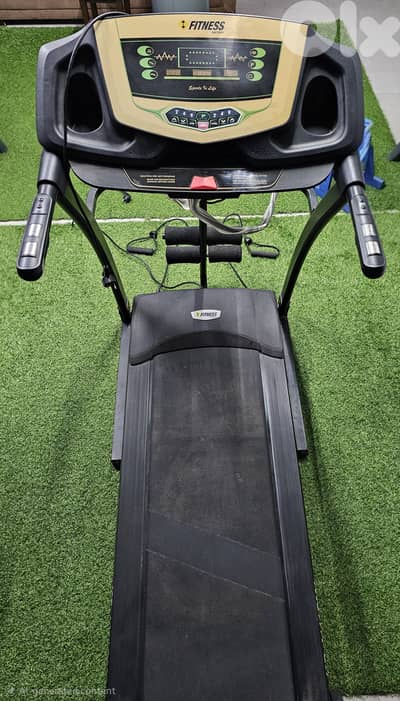 Treadmill with a vibration belt attachment - مكنة مشي