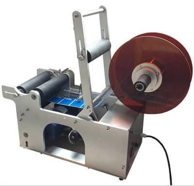 Labeling machine   آلة وضع الملصقات