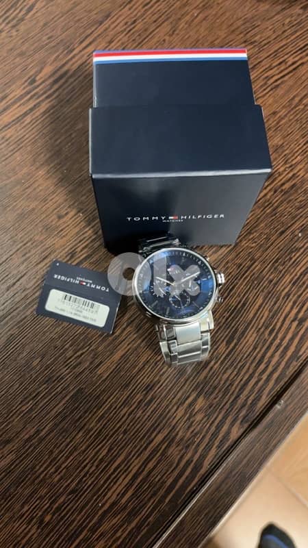 tommy watch new for only 140$ 1