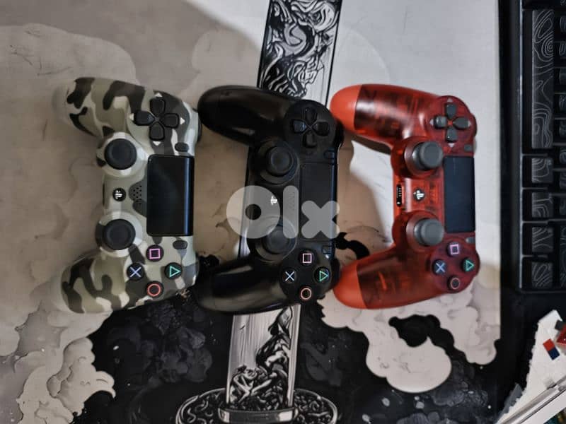 ps4 3 controllers and 5 cds 2