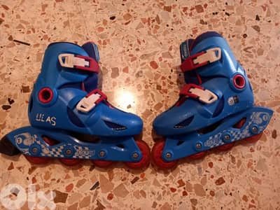 oxelo patin size 30'- 32