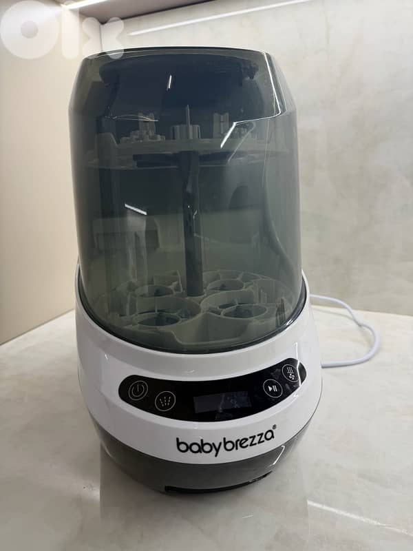 Baby brezza ( 3 in 1 ) washer , sterilizer and dryer pro 1