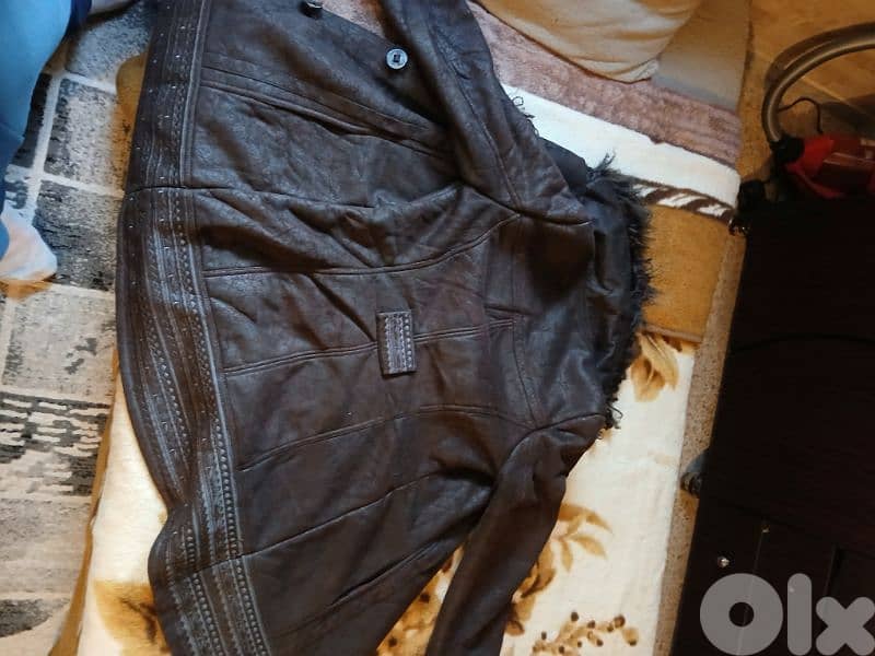 Winter Leather Jacket With Fur and Feathers 1