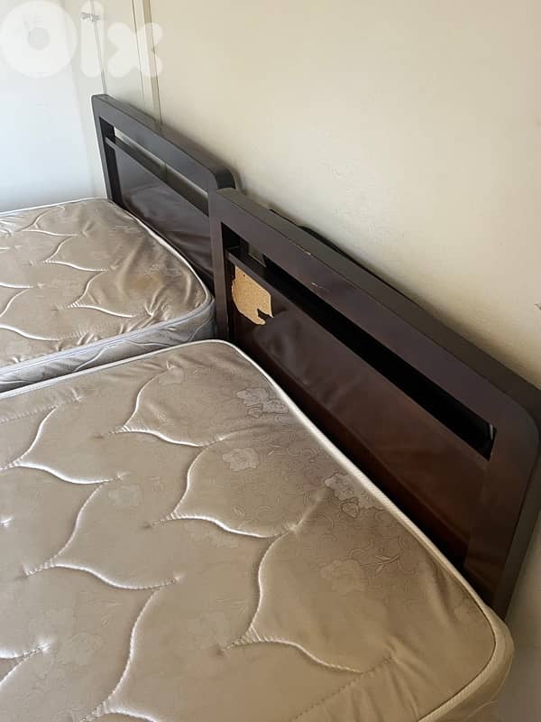 2 single beds and mattresses 1