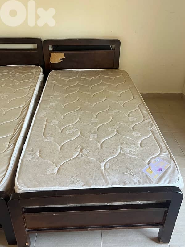 2 single beds and mattresses 2