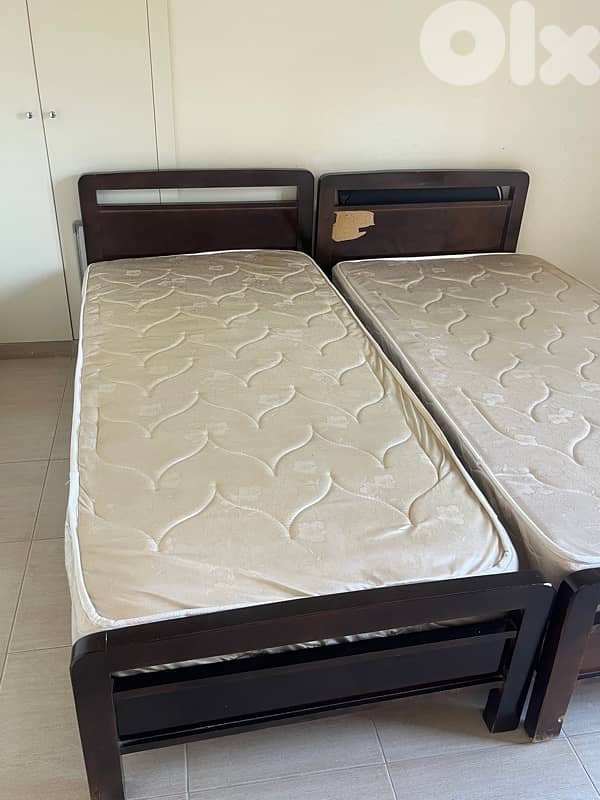 2 single beds and mattresses 3