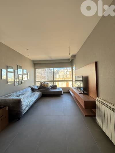 A Modern Furnished apartment for rent in Achrafieh in a very nice Bldg