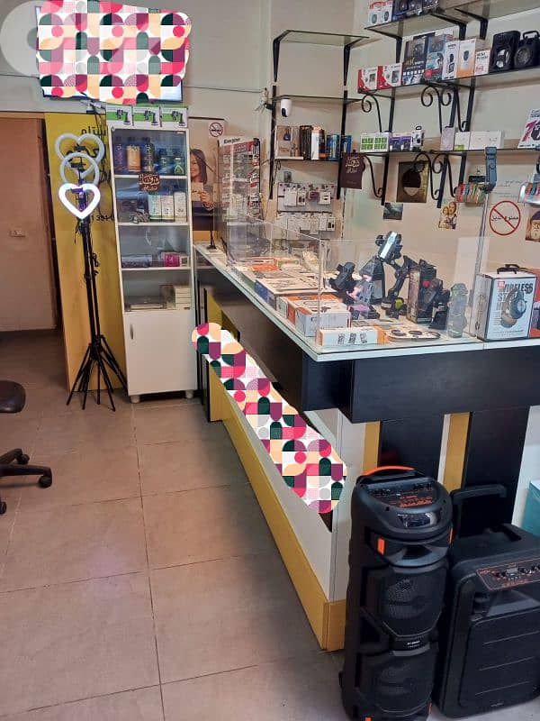 اكسسوارات سيلولير وديكور محل للبيع 2