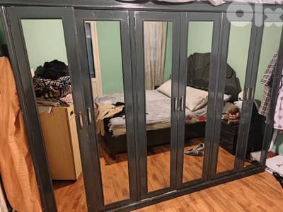 wardrobe. خزانة