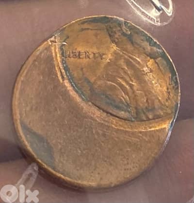 عملة سنت أميركي خطأ اوف سنتر