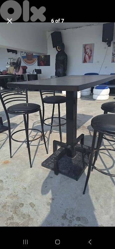 bar with tables and chairs