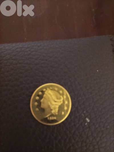 عملة امركية سعرها 450  دولار  ذهب عيار 22