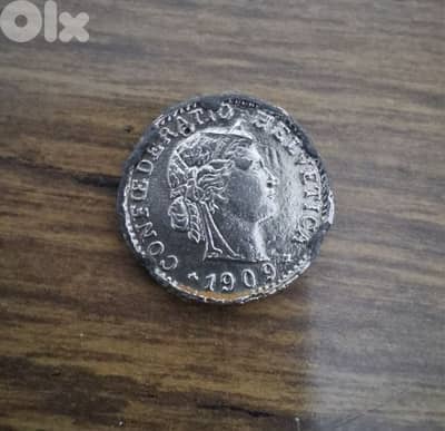 عملة سويسرية من فئة 20 سنتيمًا صدرت عام 1909،