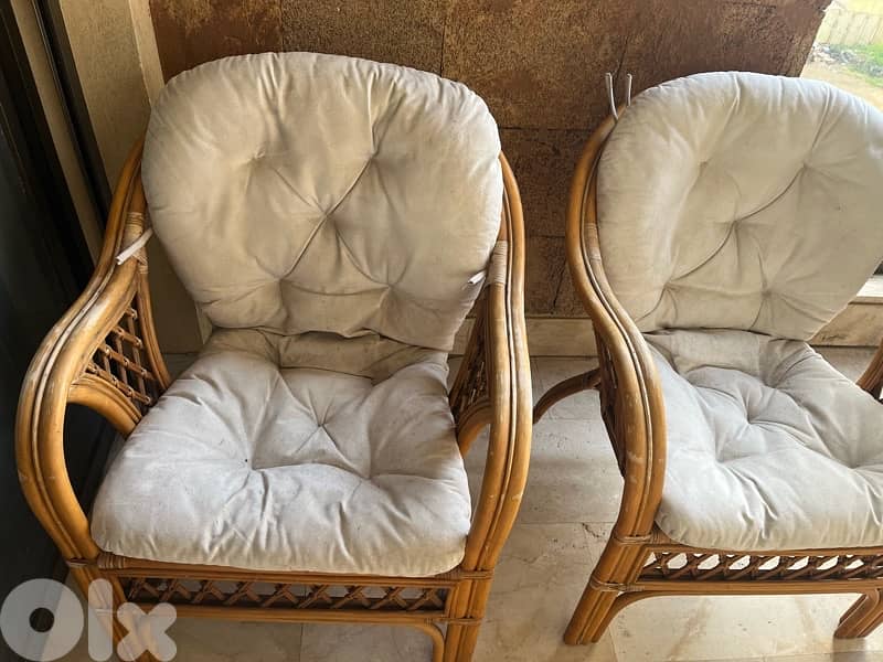 two bamboo chairs with its table 1
