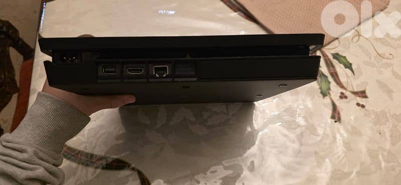 ps4 with 3 controllers and 7 games and steering wheel 1