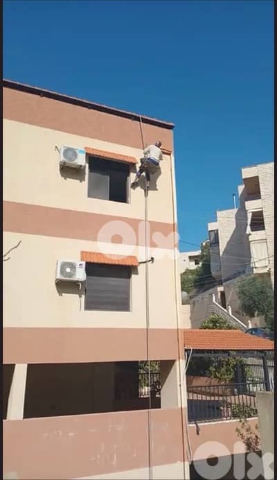 عزل بناية من الخارج على المرجوحة