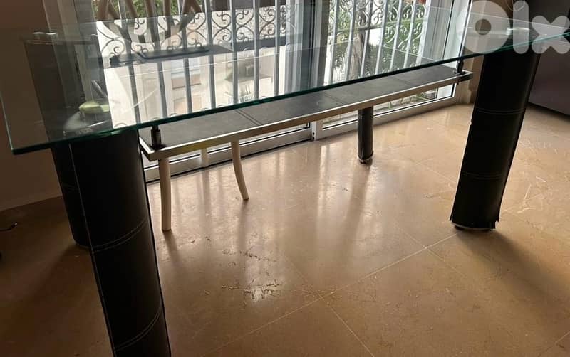 Modern rectangular glass table with black legs 1