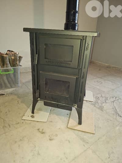 sobia 7atab ma3 furn (wood stove)