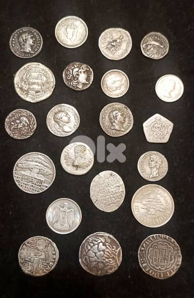 ٢١ قطعة فضة