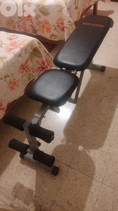 Foldable exercise bench بنش للرياضة barely used