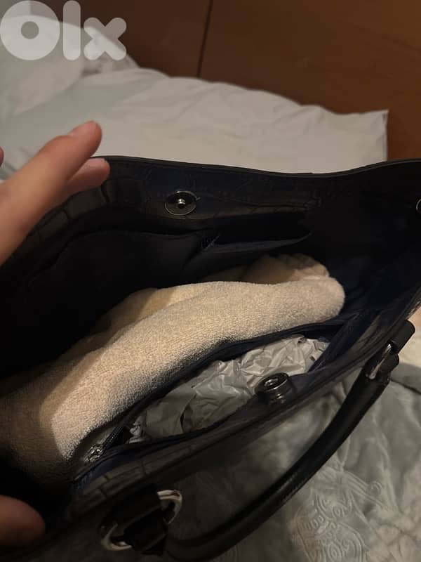 3 hand bags all new except for the prada one 2