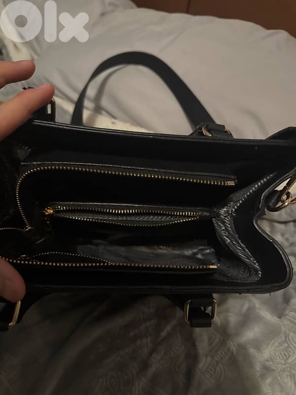 3 hand bags all new except for the prada one 5