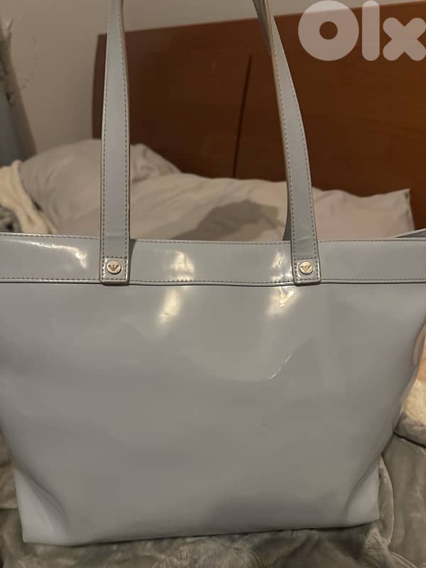 3 hand bags all new except for the prada one 7