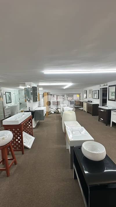 محل مع شقة للبيع في ساحل علما