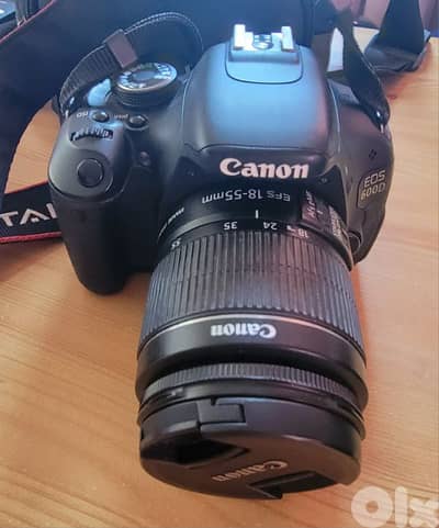 Used camera and tripod