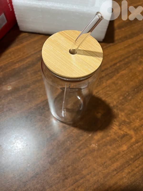 glass latte with its straw 1