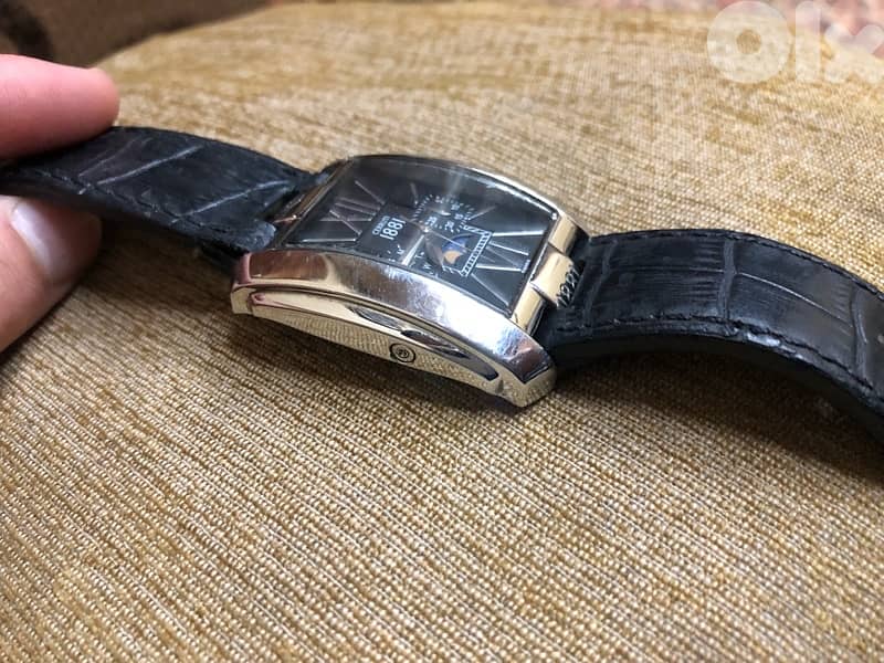 Inside, the day, month, moon, and stars. switzrland swiss made orginal 6