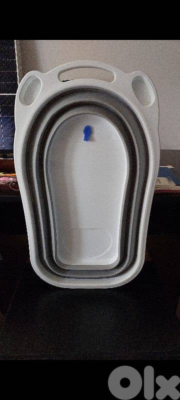 Foldable bath like new very good condition with bath seat 1