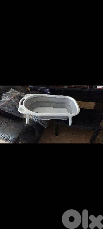 Foldable bath like new very good condition with bath seat 2