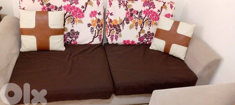 2 big sofas and 2 small sofas and 2 tables 1