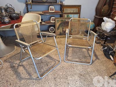 pair of vintage 1970 foldable chairs