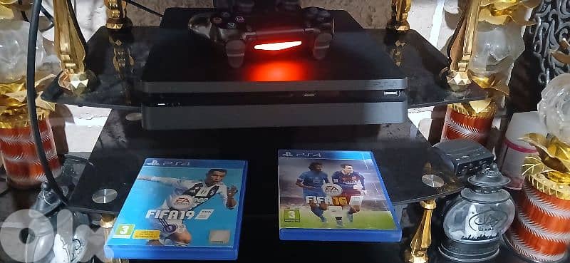Ps4 slim 500 gb with one original controller  And 2 game 2
