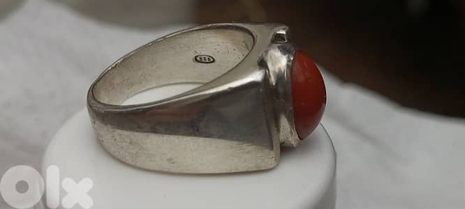 silver ring with coral stone