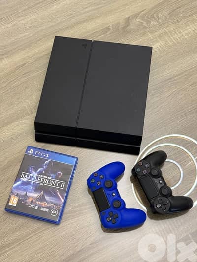 Ps4 fat 1TB + 2 controller + 1 game (Excellent condition)
