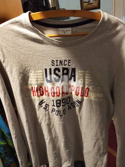 Polo grey T-shirt.