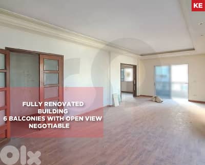fully renovated building,6 balconies -open view- Badaro REF#KE126948