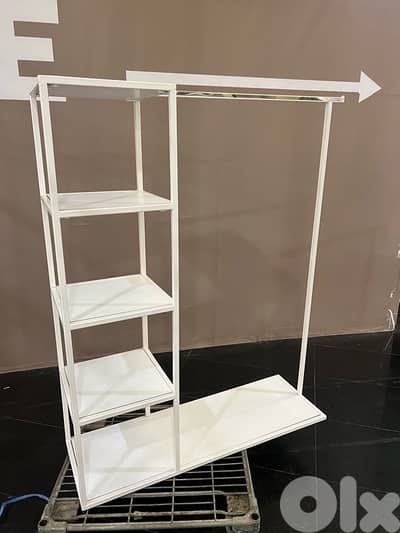 stand with racks for clothes