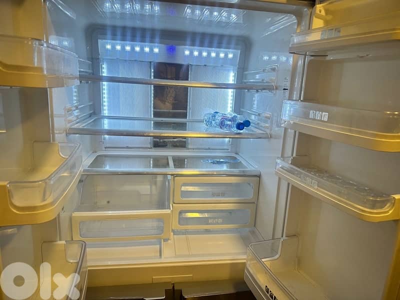 sharp fridge and a cooler 3