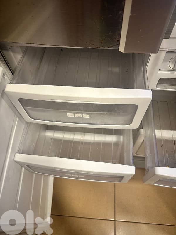 sharp fridge and a cooler 5