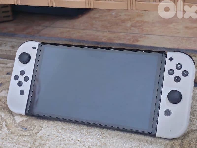 Nintendo switch oled like new 1