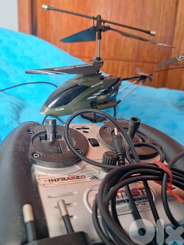 Working Helicopters with their original remotes, cables and more. 3