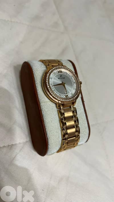 westar rose gold watch