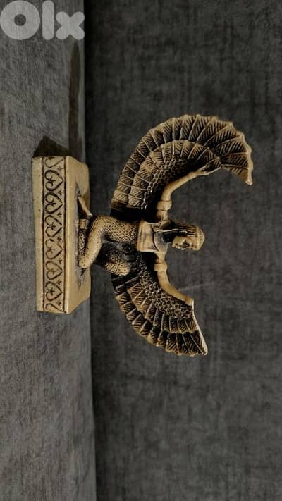 Assyrian-style decorative statue made from marble-based