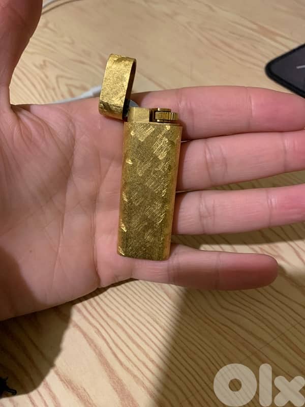 golden lighter seems new 1