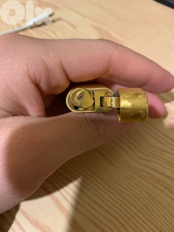 golden lighter seems new 3
