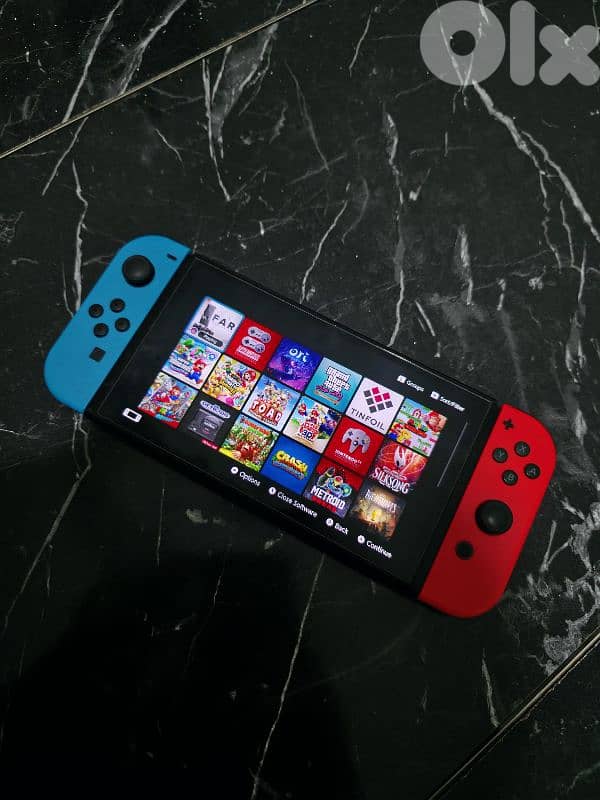 Nintendo switch OLED Modded 20+ Games + Dock 1